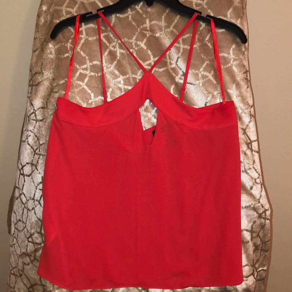 Orange sleeveless blouse